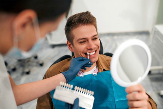: Patient in Black Forest smiling after cosmetic dentistry